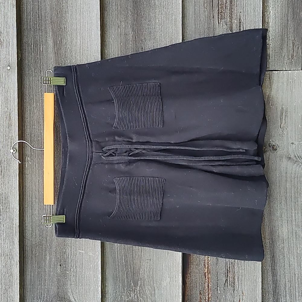 Candie's knit skater skirt w/ lace up corset front and textured pockets - size M